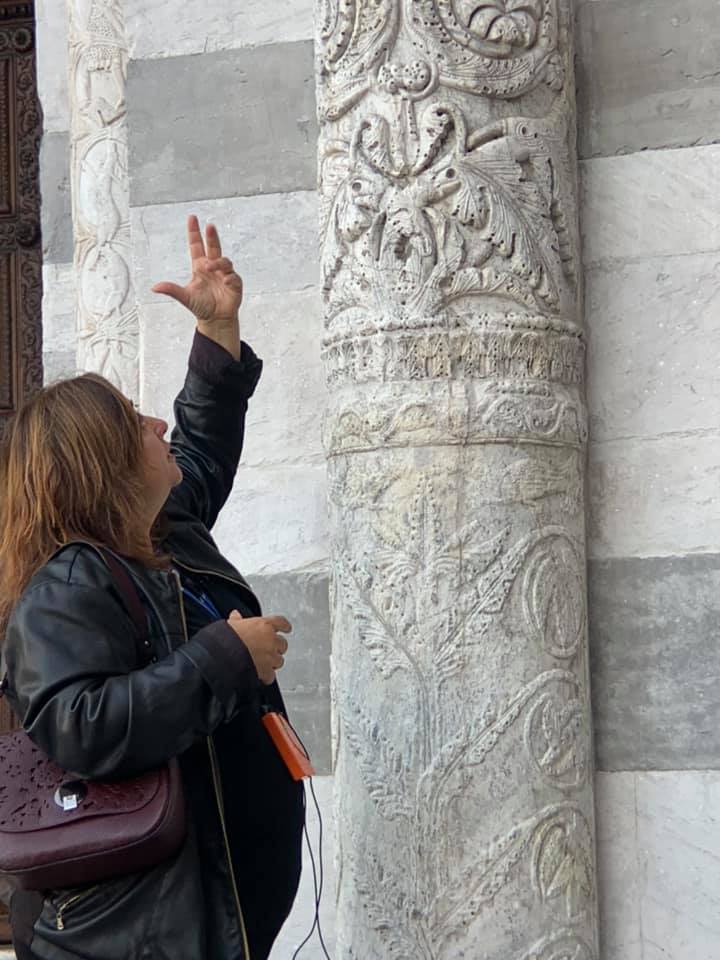 Anna, shows the bas relief of one of the columns made of Carrara marble.